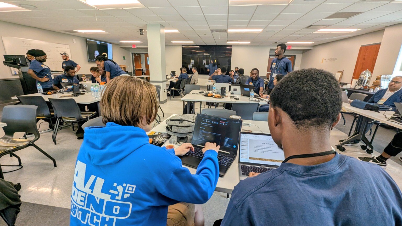 Student teams building together during a WVBF-supported hackathon